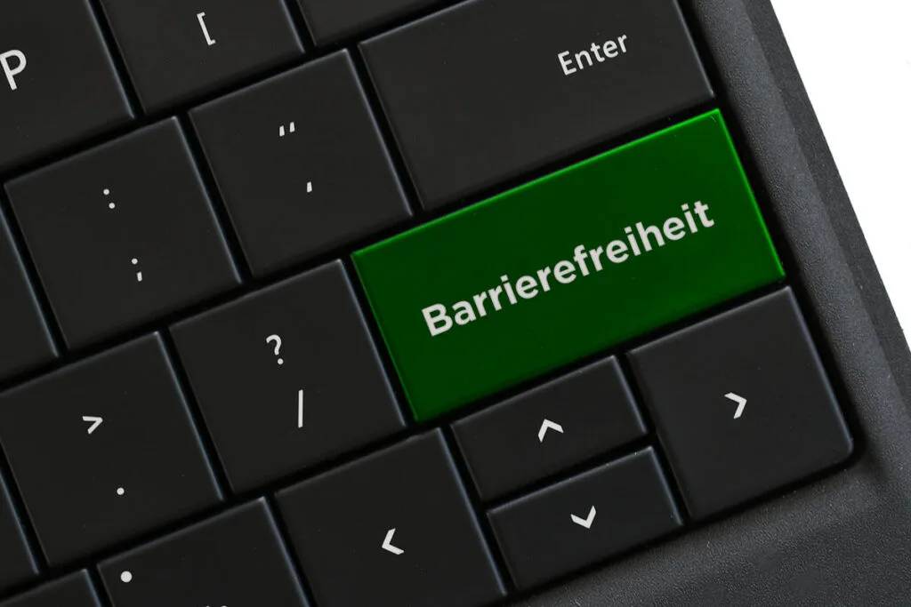 Schwarze Tastatur mit dem Hinweis zur Barrierefreiheit auf der Eingabetaste